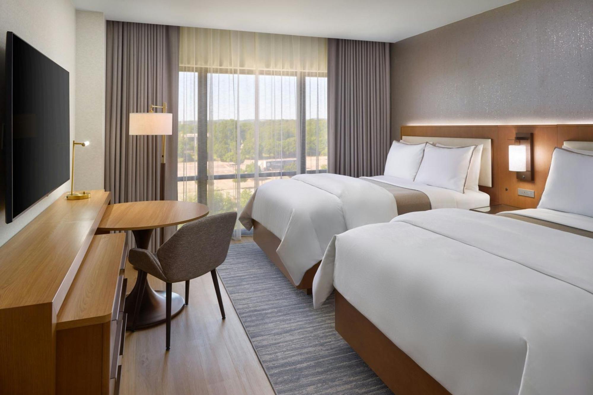 1 king and 2 queen beds, 2 Bedroom Executive Suite